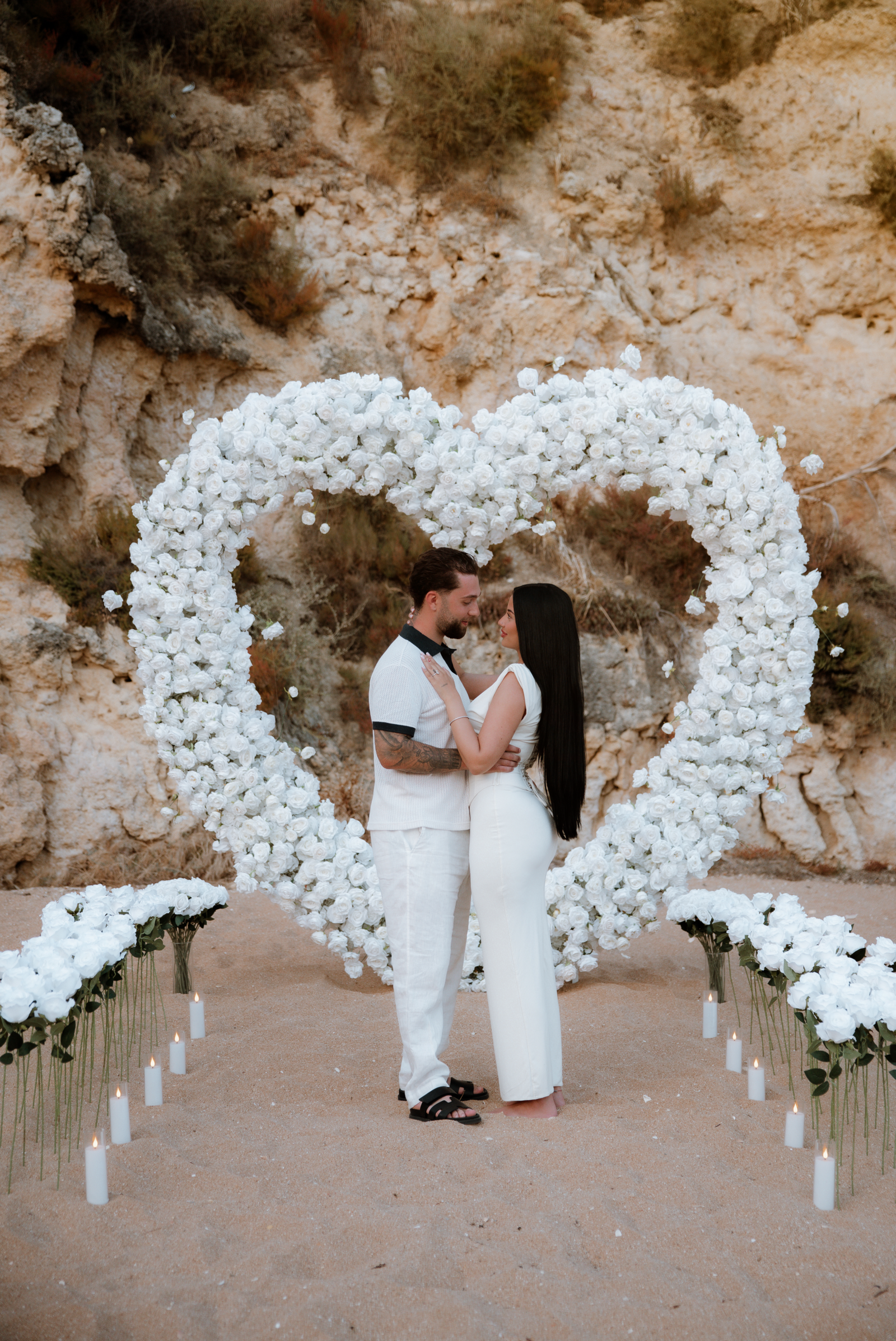 Heart arch marriage proposal setup in Algarve, Portugal